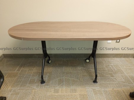 Picture of Two Brown Oval Tables