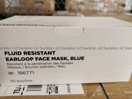 Photo de 8 boîtes de masques non médica