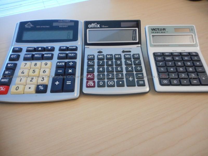 Photo de 4 calculatrices variées